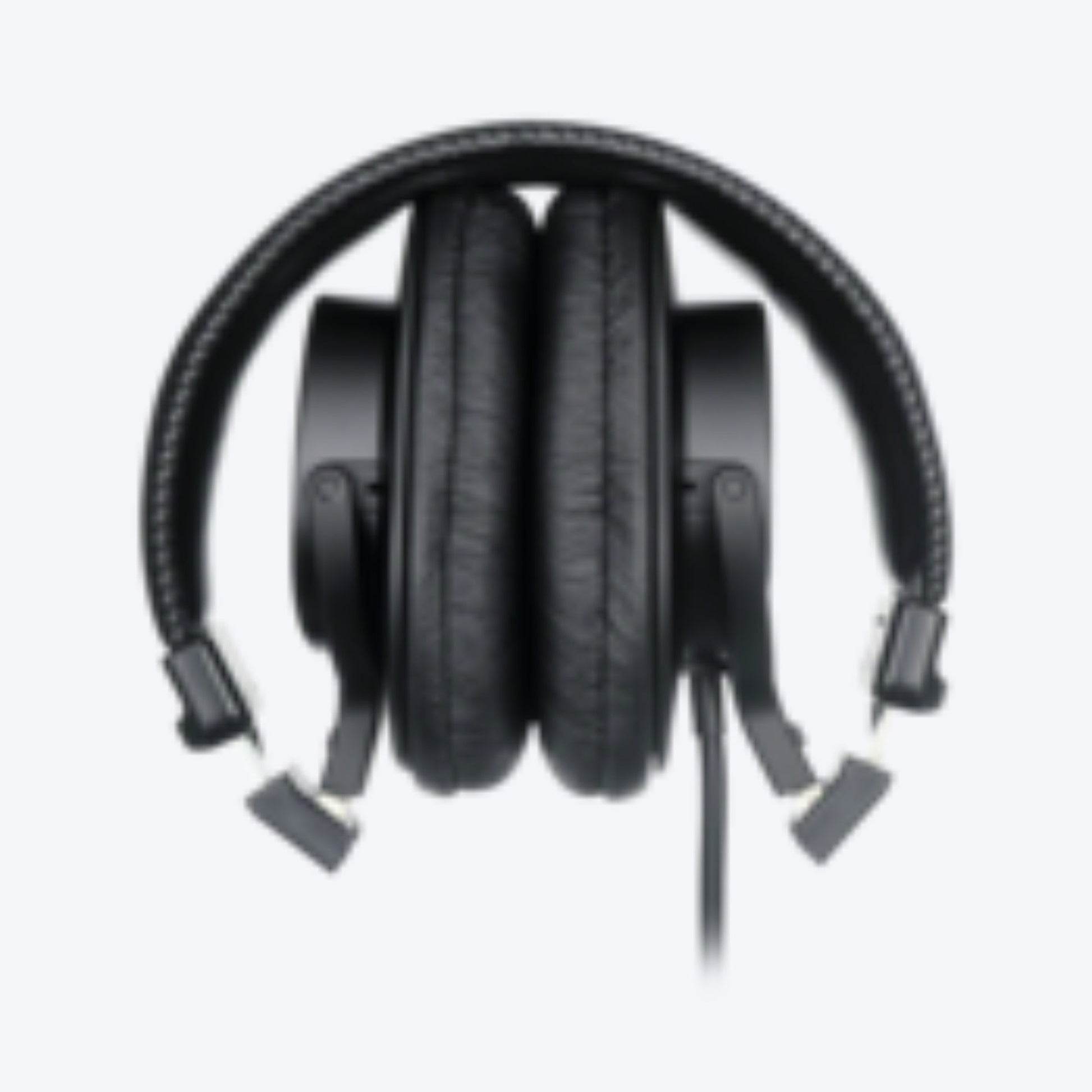 Black headphones on a white background
